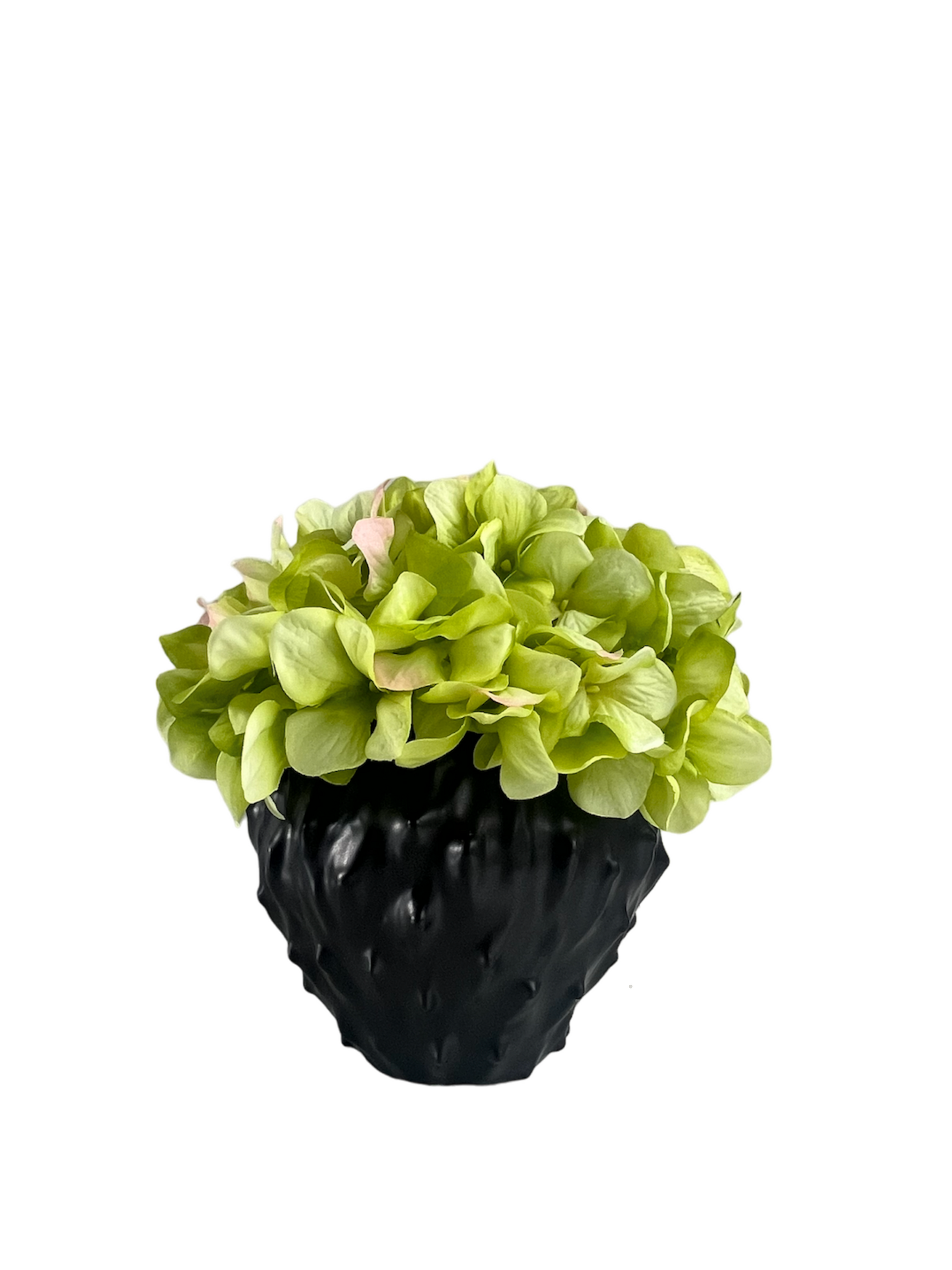 lime green artificial hydrangea set in a black spiky planter