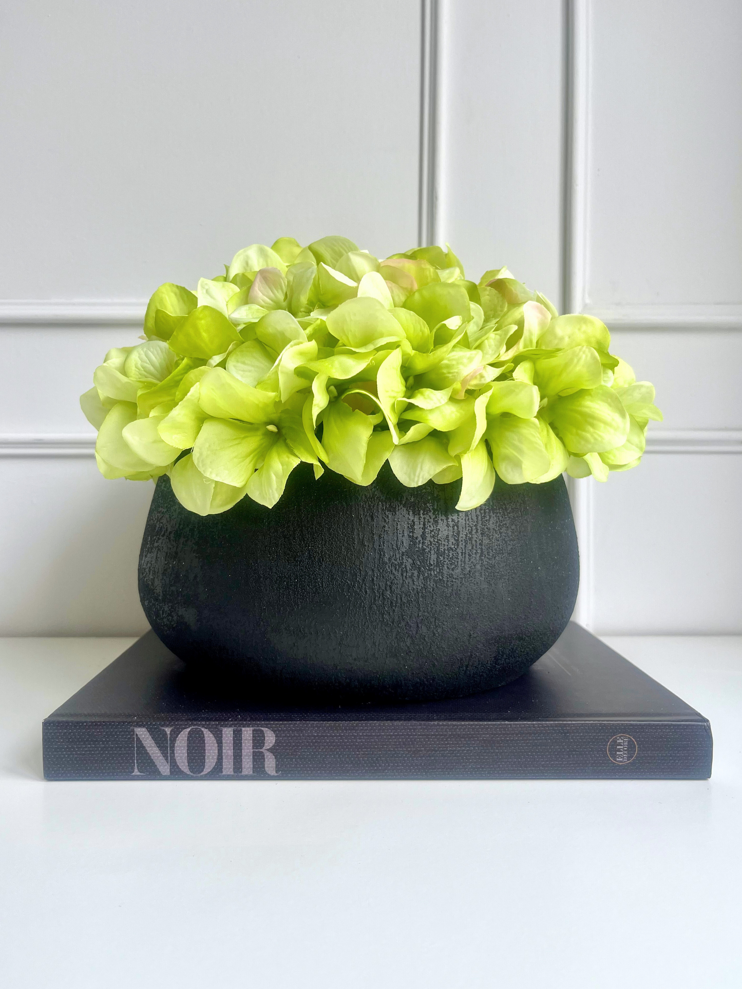 Lime green hydrangea in black melange terracotta bowl planter