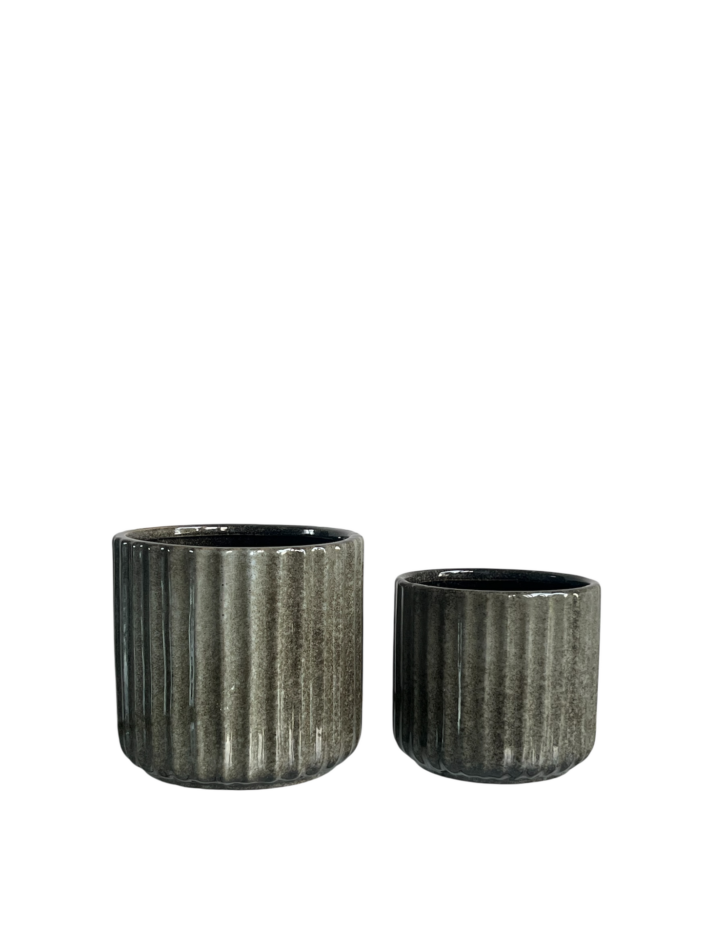 Melange green ribbed effect plant pot large next to a melange green ribbed effect plant pot small.