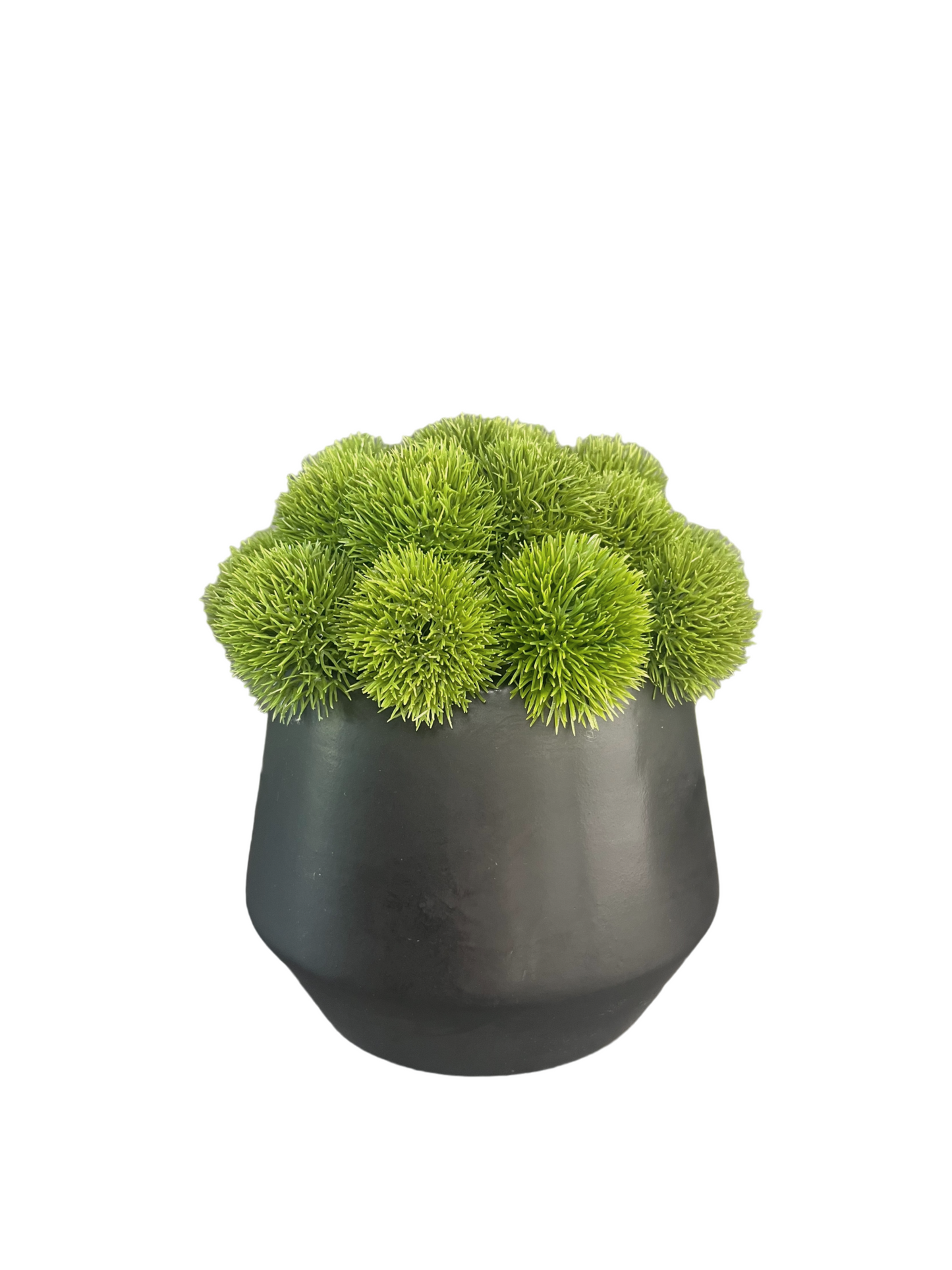 Artificial vibrant green dianthus set in a black matt plant pot.