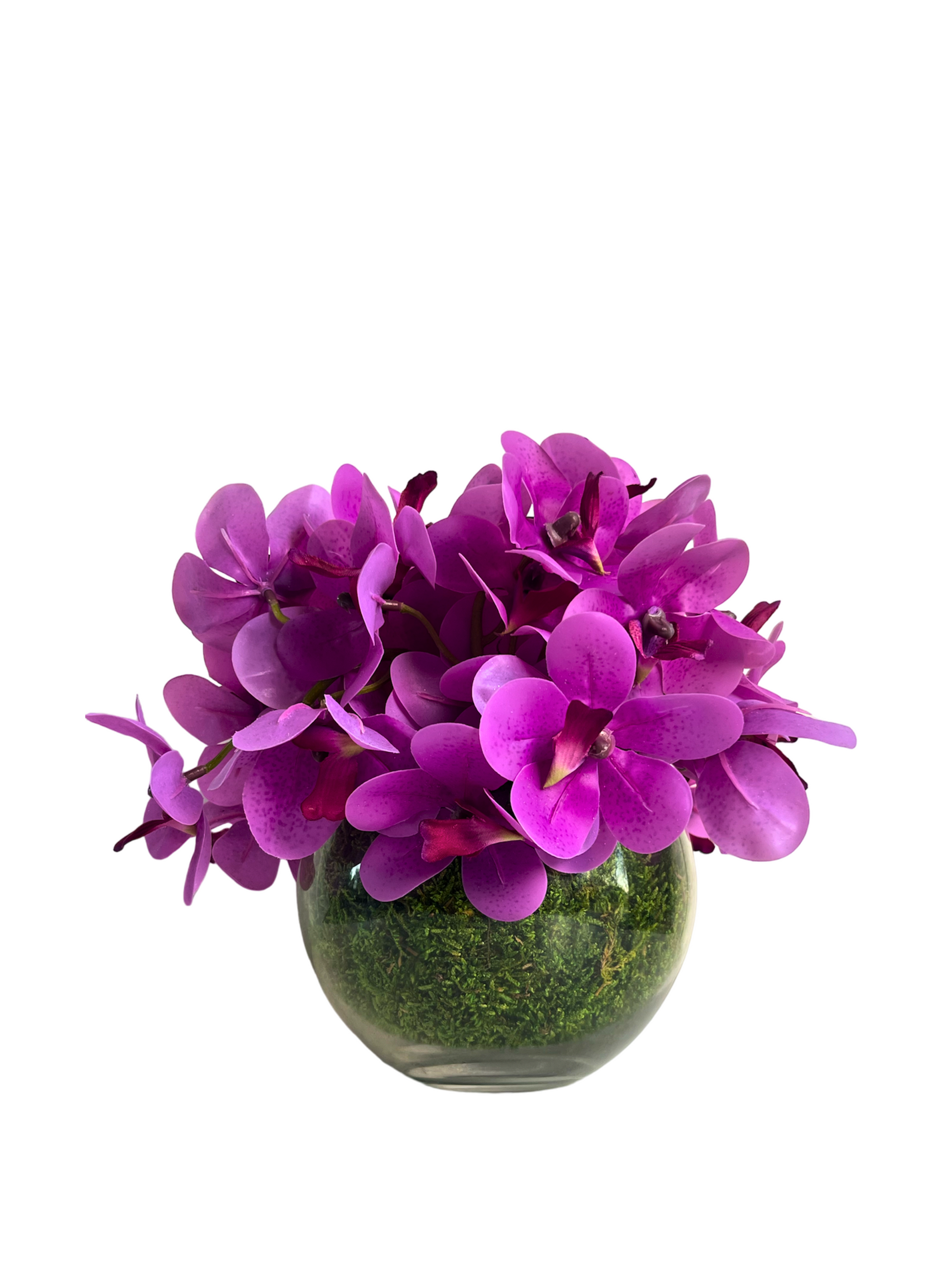 Artificial pink orchids set in a preserved moss lined glass ball vase 